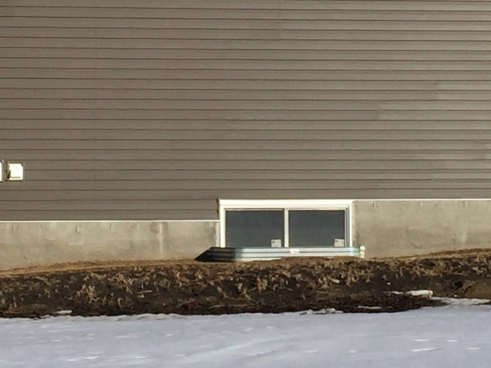Leaky basement egress window repair
