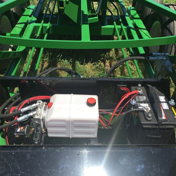 Ideal-Tile-Stringer-Cart-Walking-Beam-Model-Hydraulic-pump,-resevoir,-battery-and-charging-system.