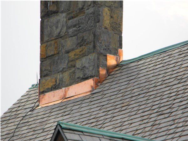 Copper Flashings Along Base of Chimney