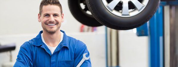 varsity mechanical services mechanic with tool