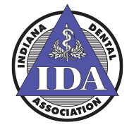 The logo for the indiana dental association is a triangle with a snake on it.