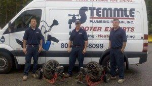 Stemmle employees in front of work van Stemmle employees in front of work van
