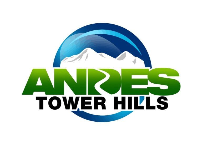 Logo for Andes Tower Hills featuring the text in green, centered over a blue circular background with white mountains.