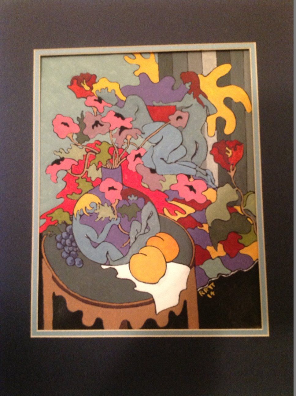 A framed painting of a table with fruit and flowers