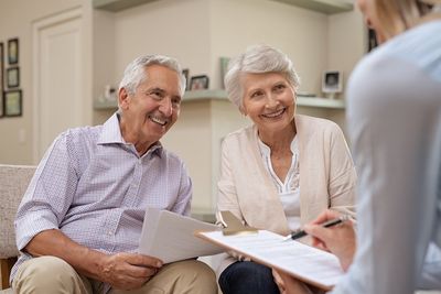 Insurance Agent — Senior Couple Meeting With Insurance Adviser in Flower Mound, TX Insurance Agent — Senior Couple Meeting With Insurance Adviser in Flower Mound, TX