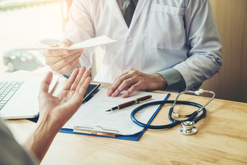 Medicare Insurance Plans — Doctor Giving Medical Prescription in Flower Mound, TX