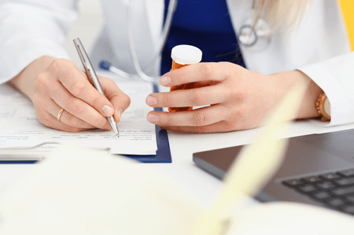 Medicare Insurance Plans — Doctor Hold Jar Of Pills in Flower Mound, TX