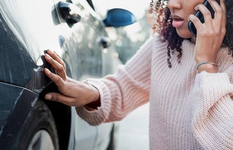 Girl with Damaged Car Calling for Help — Shrub Oak, NY — Girolamo Insurance Agency Girl with Damaged Car Calling for Help — Shrub Oak, NY — Girolamo Insurance Agency