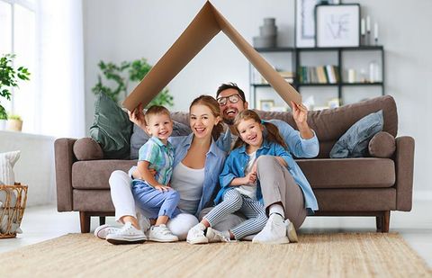 Happy Family at Home — Shrub Oak, NY — Girolamo Insurance Agency Happy Family at Home — Shrub Oak, NY — Girolamo Insurance Agency