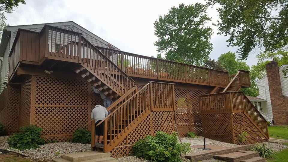 Man Examining the Deck — Repair in East Windsor, NJ
