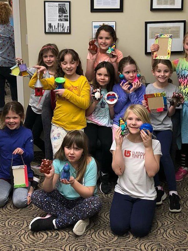 kids with their crafts they made