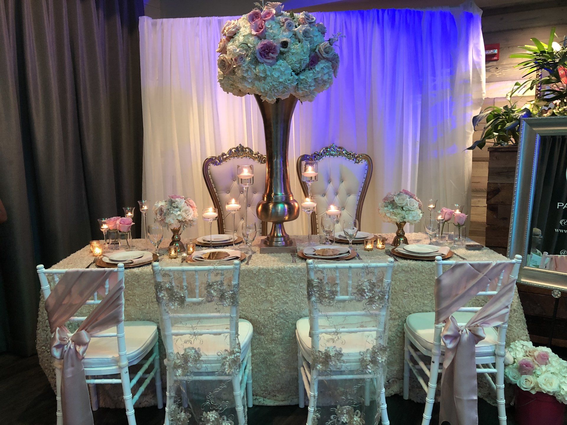Table set up with floral centerpieces (