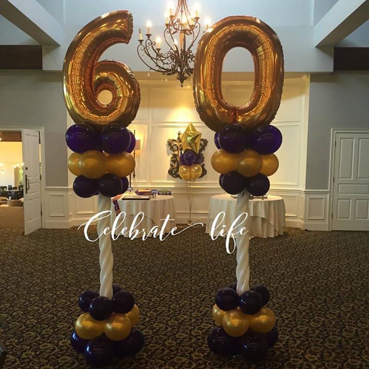Balloon decorations with two columns (a 6 on one and a 0 on the other) and balloon bouquet in the background.
