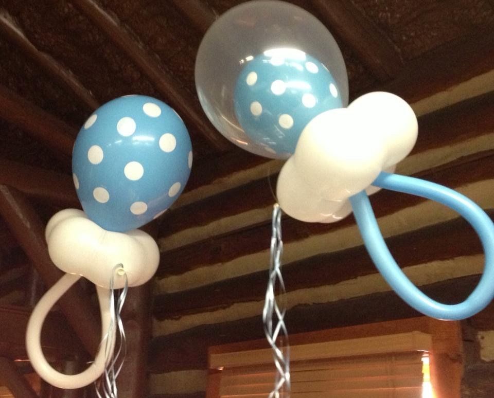 Creative balloon creations made to look like baby rattles.