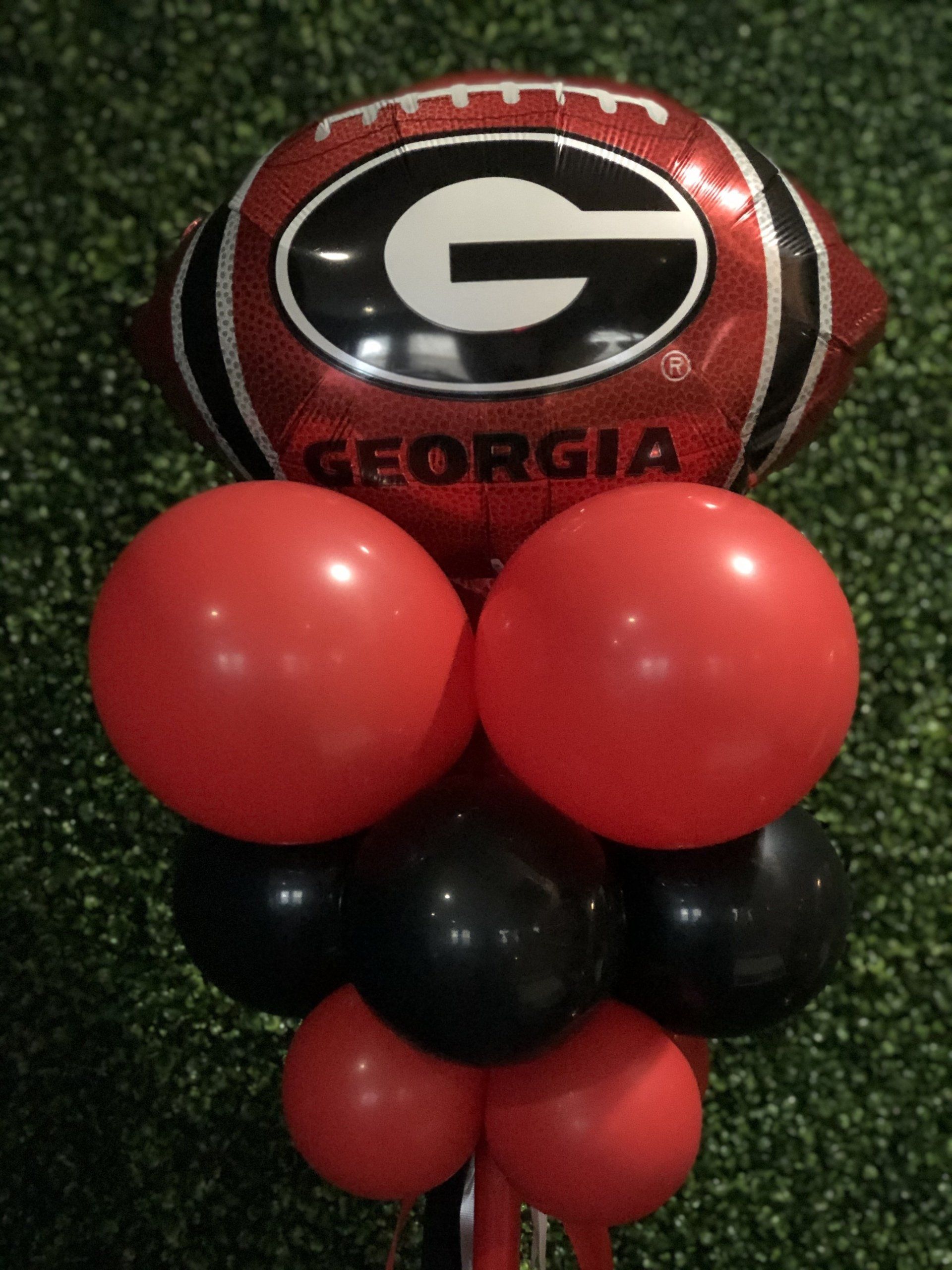 Georgia Bulldogs football themed balloon with red balloon base for sports birthday or team celebration