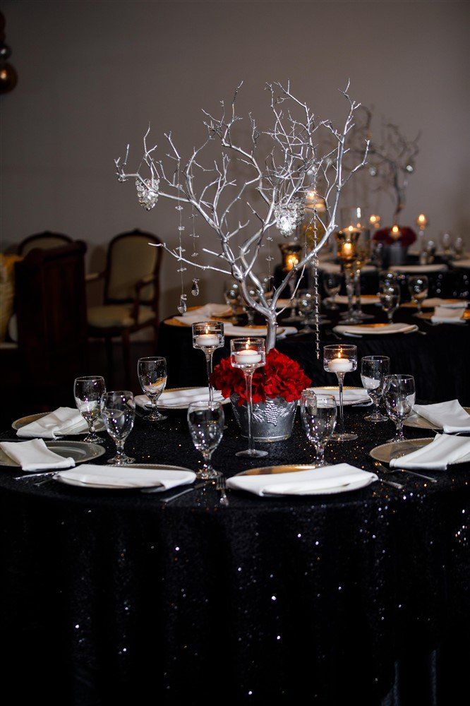 Decorative white lighted branches centerpiece with candles for modern event styling