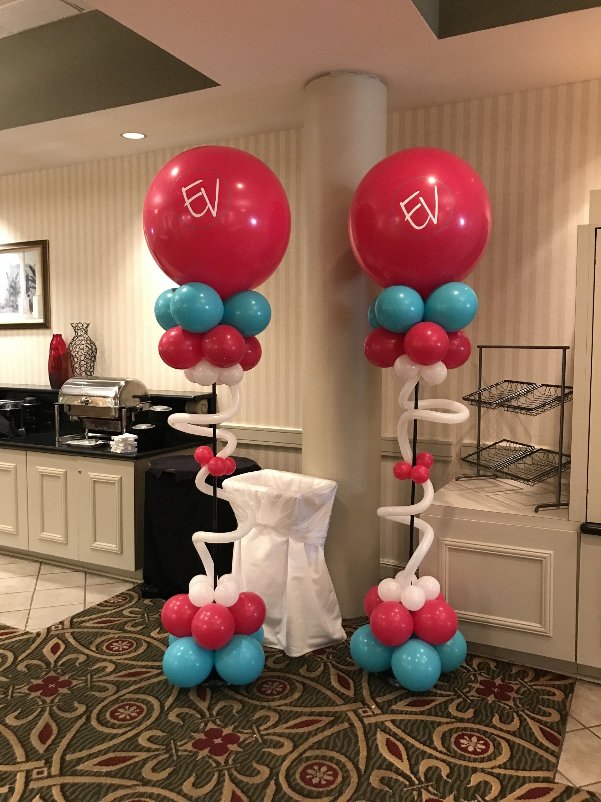 two fun, beautiful and non traditional columns created with multiple styles and colors of balloons.