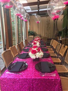 balloon design floating from the chairs.