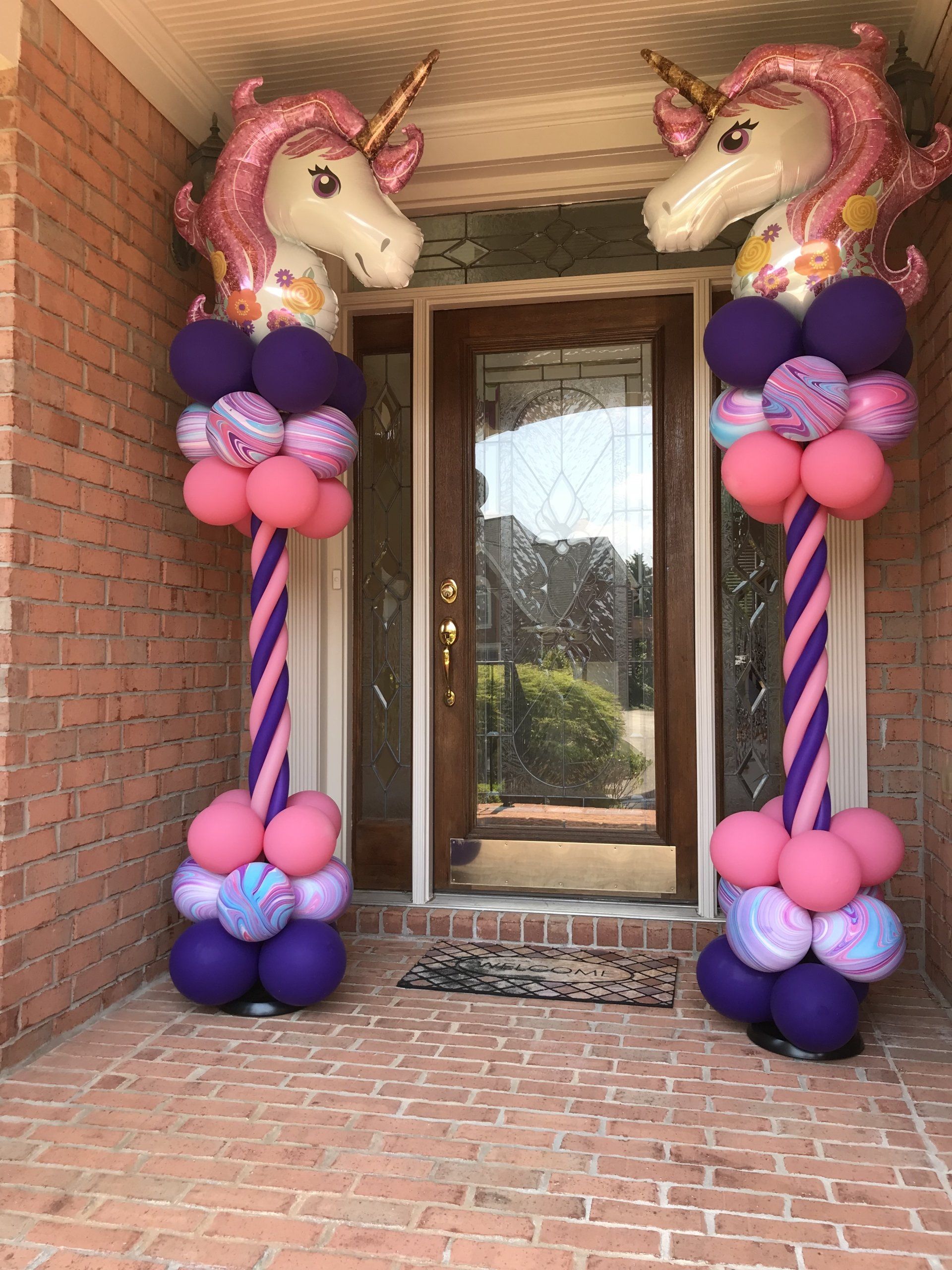 balloons with unicorns at the top