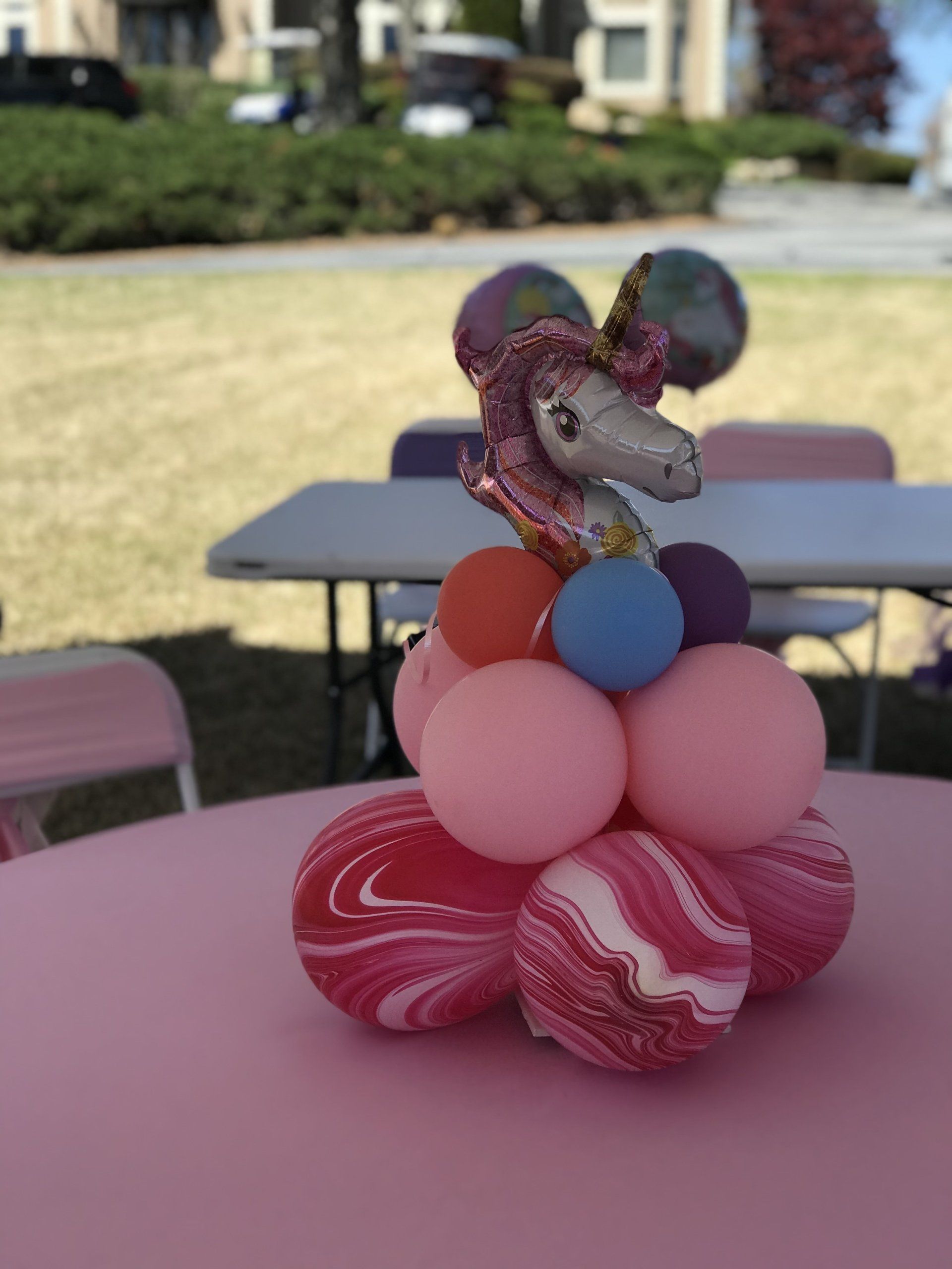 A unicorn themed balloon centerpiece.