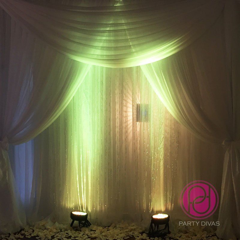 Beautiful draping with uplighting.