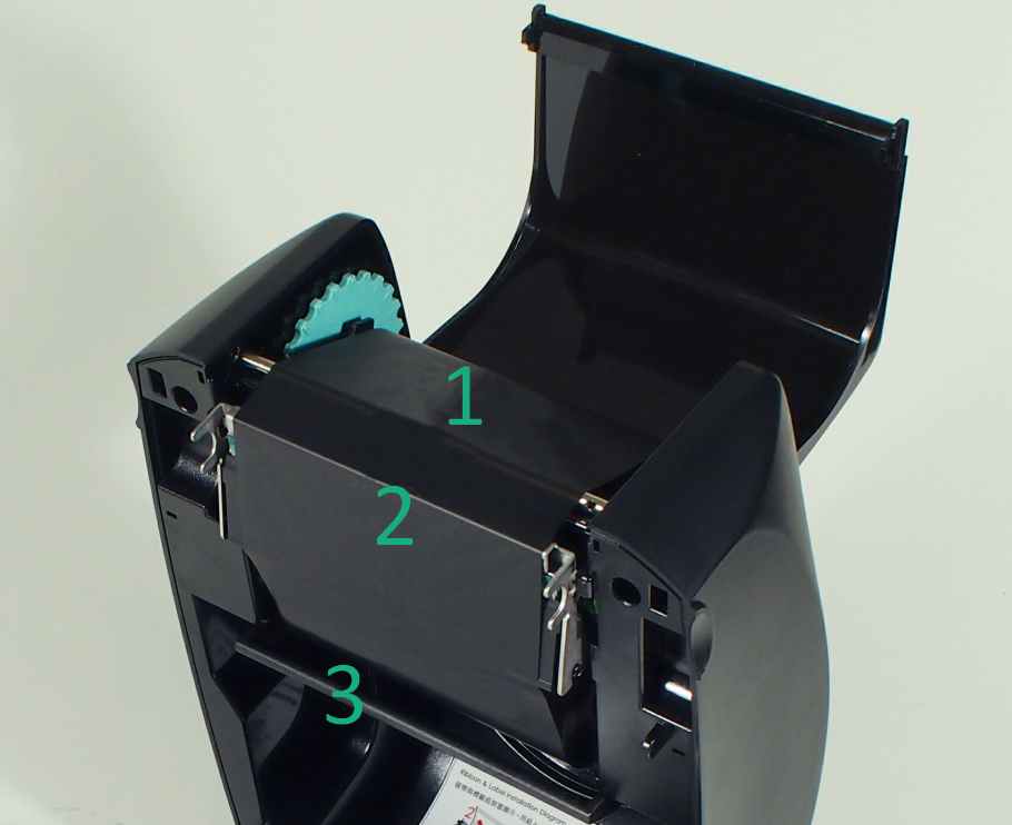 The dull side of the printer ribbon should be visible 