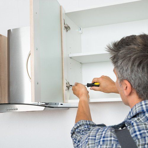 cabinet being repaired