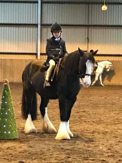 a Child sit on horse