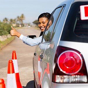 African Learner Driver Looking Out of the Car Window - Broome County, NY African Learner Driver Looking Out of the Car Window - Broome County, NY