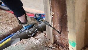 Exterminator spraying pesticide — Termite eradication in Yarrahapinni, NSW Exterminator spraying pesticide — Termite eradication in Yarrahapinni, NSW