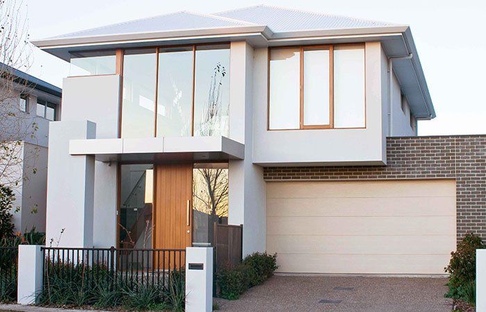 Modern home with sectional garage door