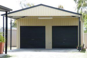 White garage with navy blue doors