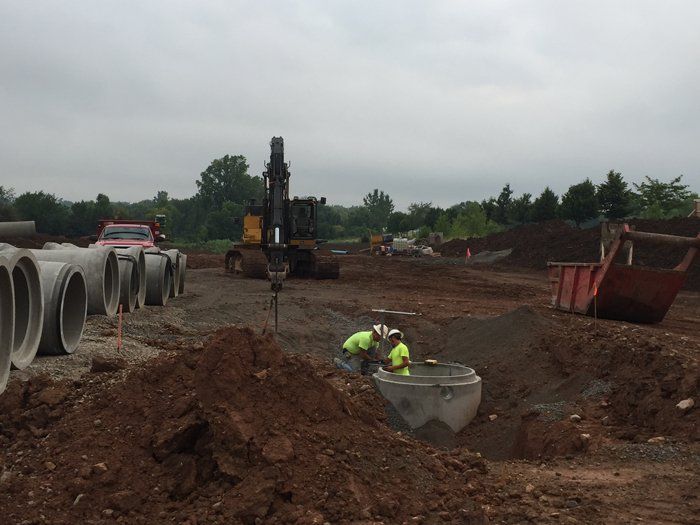 Men at Work on Construction Site — Eden, WI — Baumhardt Sand & Gravel, Inc.