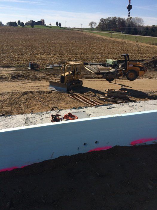 Excavator Working on Construction Site — Eden, WI — Baumhardt Sand & Gravel, Inc.
