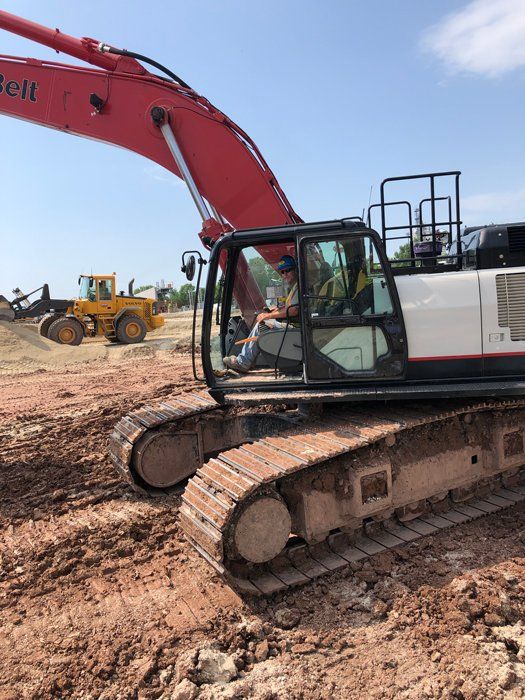 Man on Excavator Truck — Eden, WI — Baumhardt Sand & Gravel, Inc.