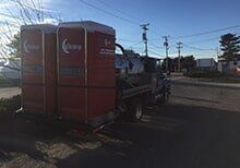 Truck Carrying Portable Rest Room — Portable Restrooms in Ipswich, MA