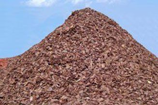 Pile Of Pine Bark Nuggets — Ruskin FL — Tampa Crosstie and Landscape Supply, Inc Pile Of Pine Bark Nuggets — Ruskin FL — Tampa Crosstie and Landscape Supply, Inc