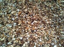 Brown River Rock Sample — Ruskin FL — Tampa Crosstie and Landscape Supply, Inc