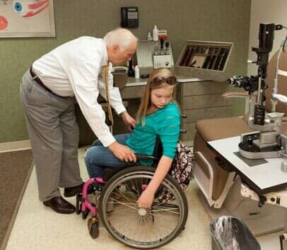 Child Inside An Eye Examination Room — Ophthalmologist in Charlottesville, VA