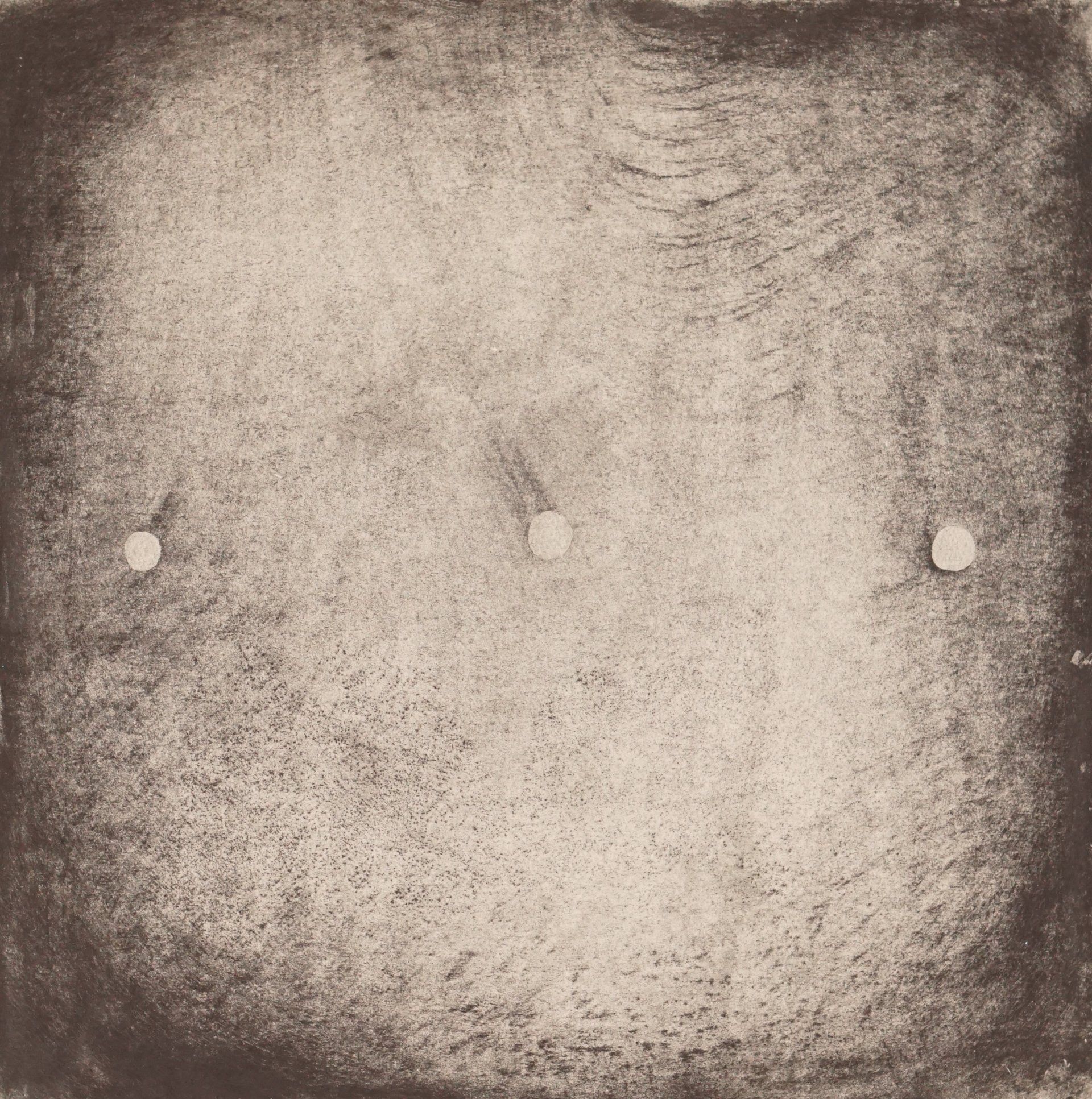 Three white dots on a textured, square, brown surface, possibly a drawing or print.