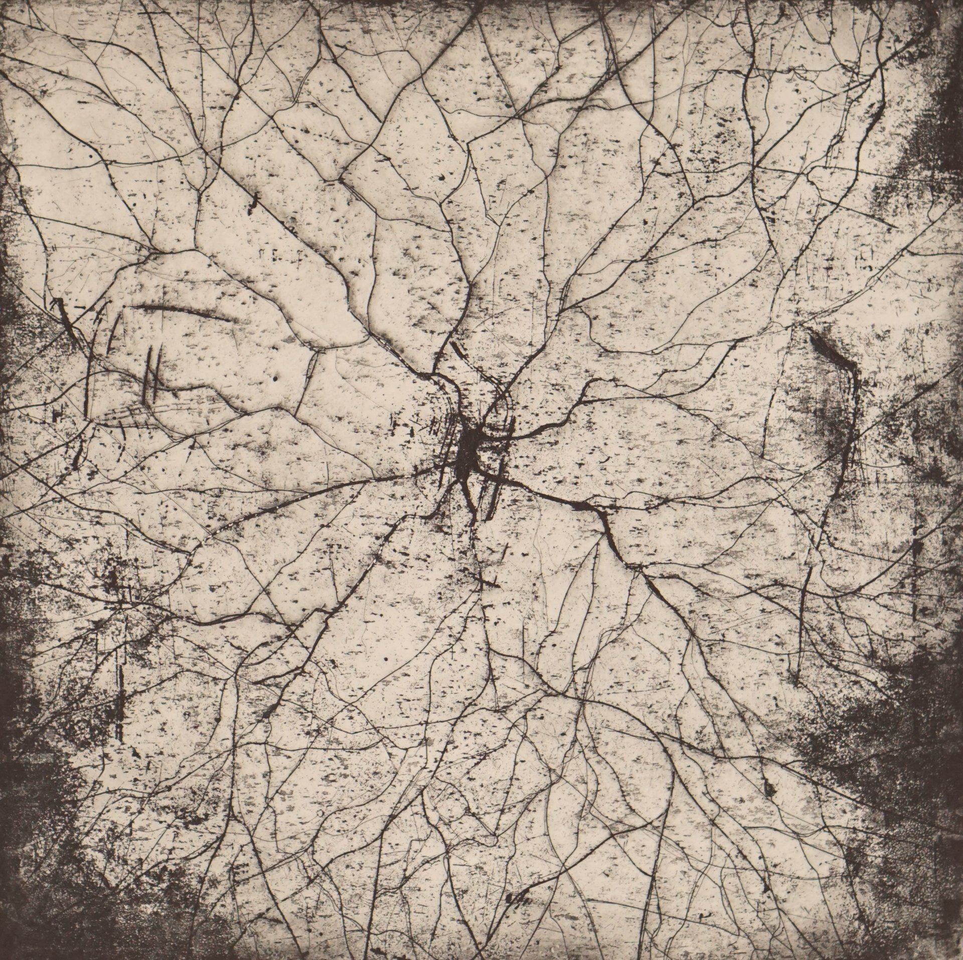 Cracked, aged square artwork. A central dark area radiates outward, with branching lines on a pale, textured background.