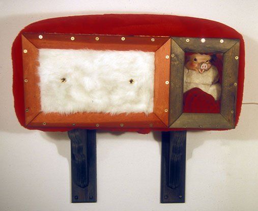 A picture frame with a picture of a pig in it