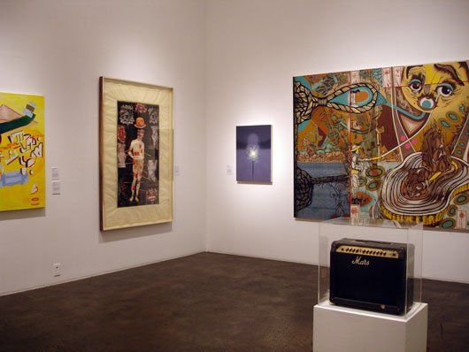 A marshall amplifier is on display in a museum