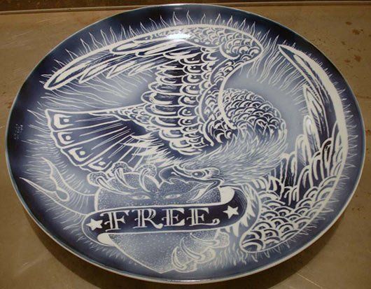 A plate with an eagle and the word free on it