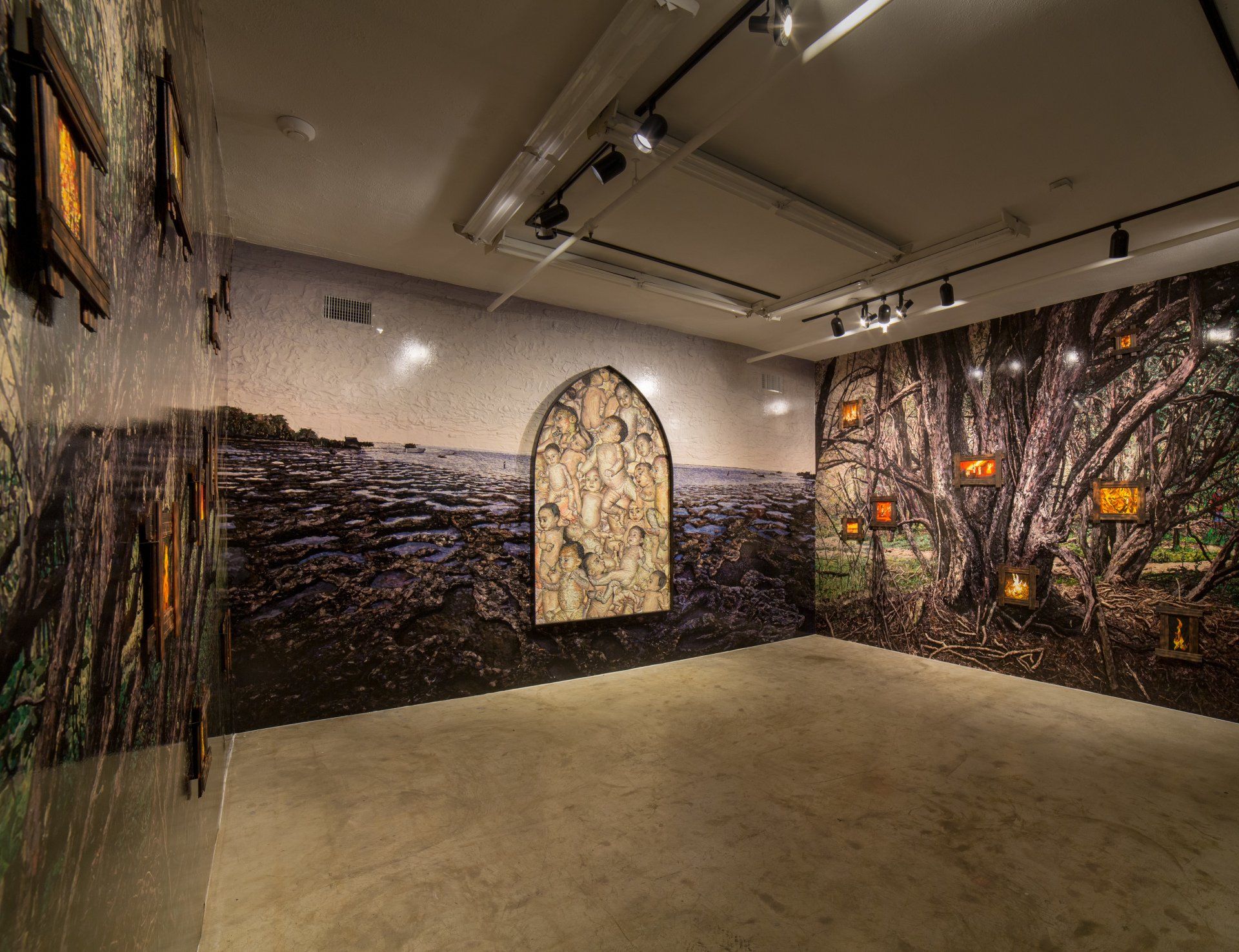 An empty room with a large painting on the wall.
