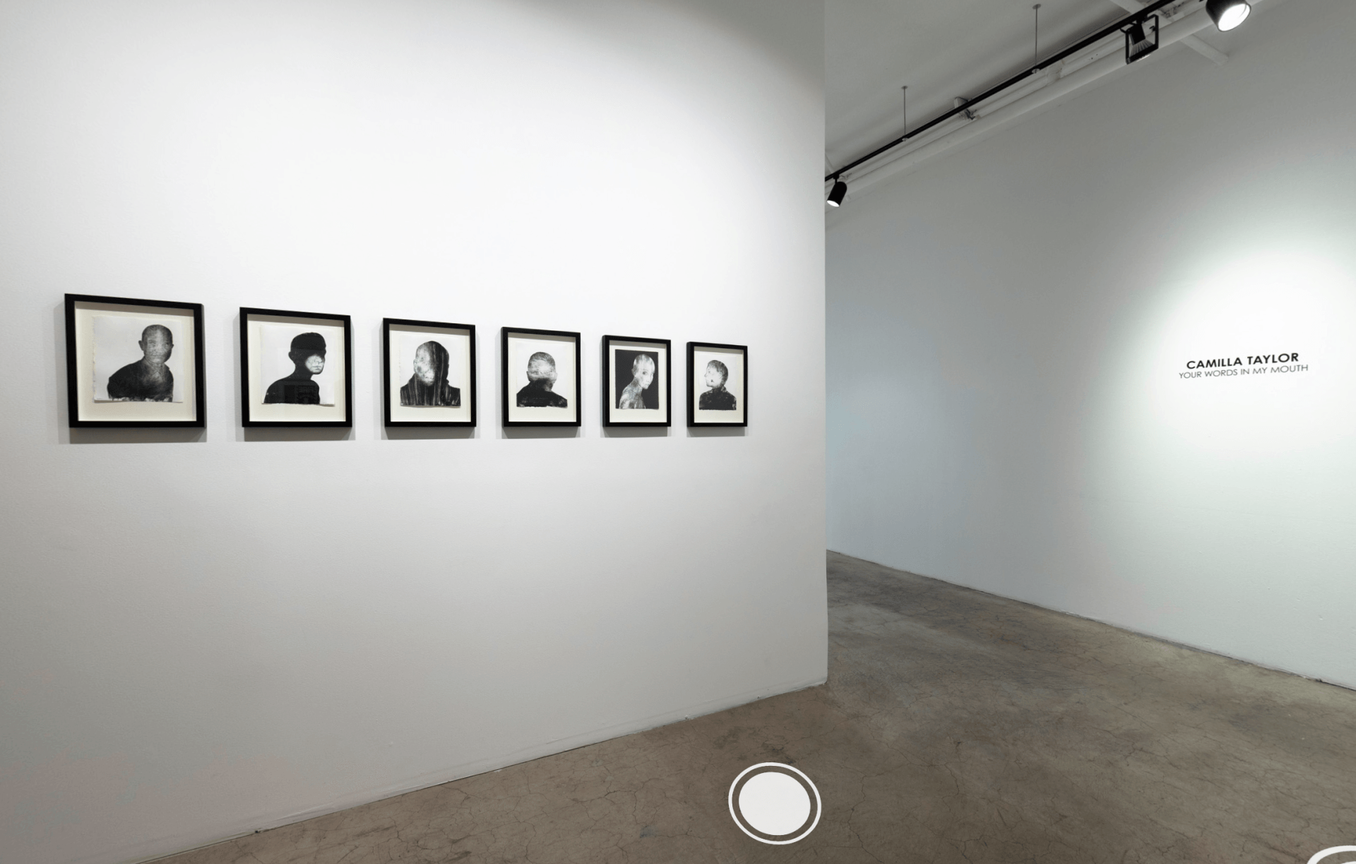 A room with a lot of pictures on the wall