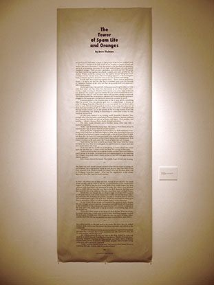 A long piece of paper that says the tower of spam life and strange