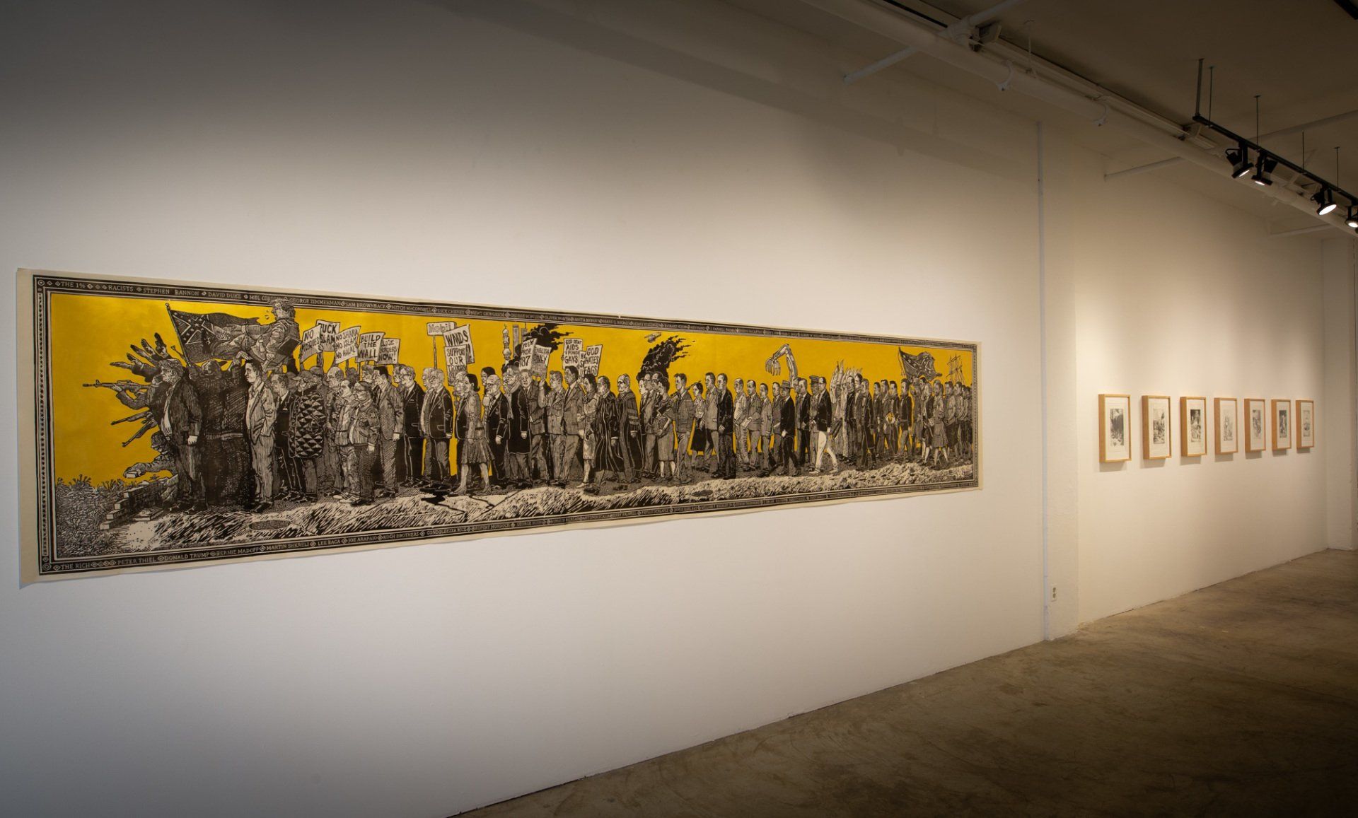 A large painting is hanging on a white wall in a museum.