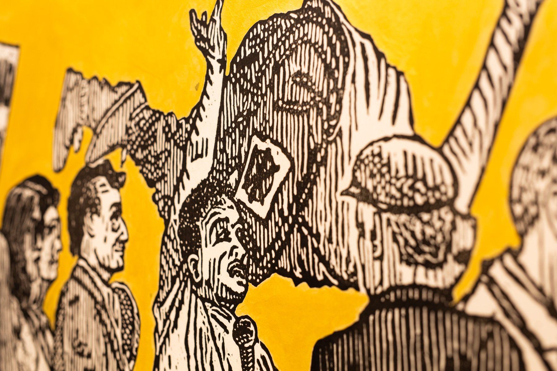 A black and white drawing of a group of people standing around a statue of liberty.