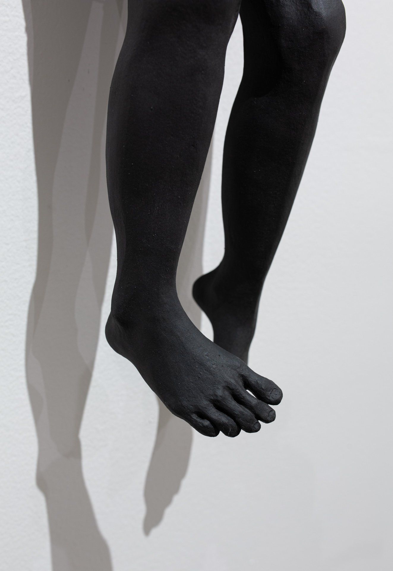 A close up of a person 's legs and feet